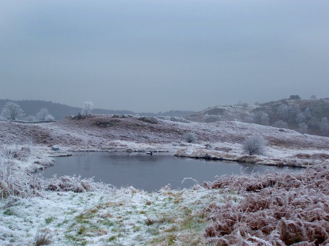 ice covering a small tarn