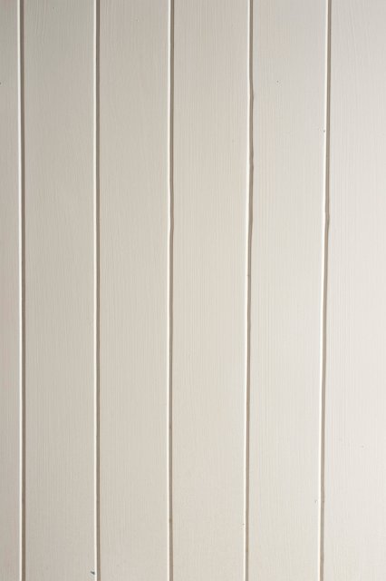 vertical lines of a wooden painted dado panel