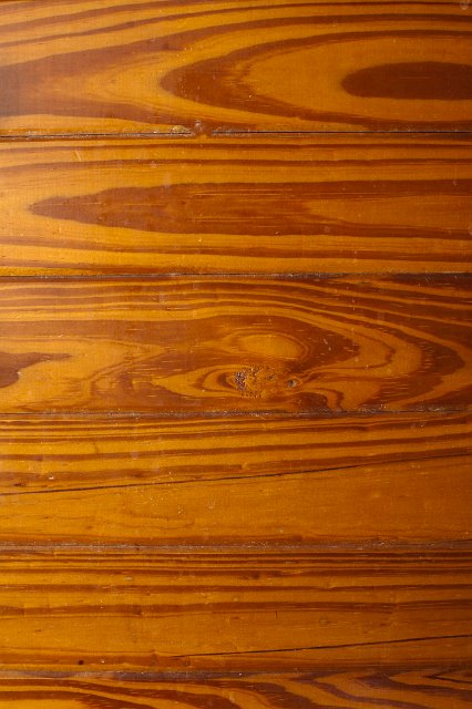 tangentially cut wood grain in some decorative wood paneling