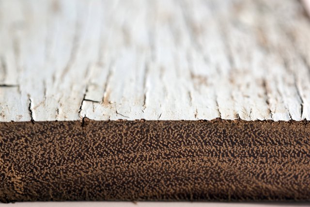 Two old wood textures showing ageing and decay, on a natural brown and the other with cracked flaking discolored white paint