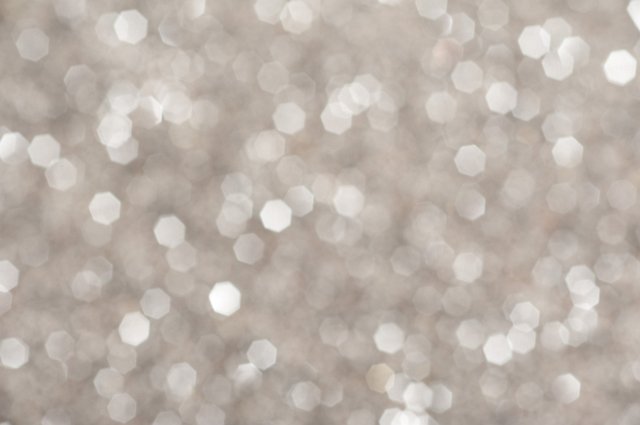Out of focus sparkling gray glitter background