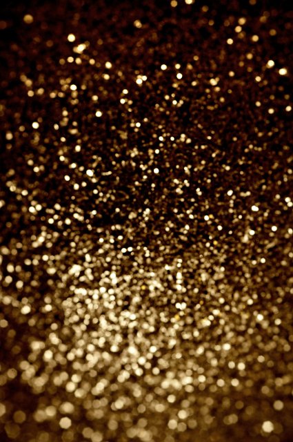 Full Frame Abstract Background of Festive Diffuse Gold Glitter
