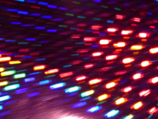 blurred stream of lights creating a high speed motion effect