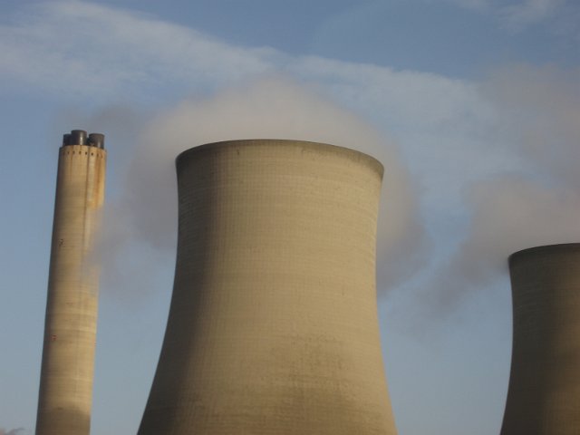 blurred cooling towers and chimney