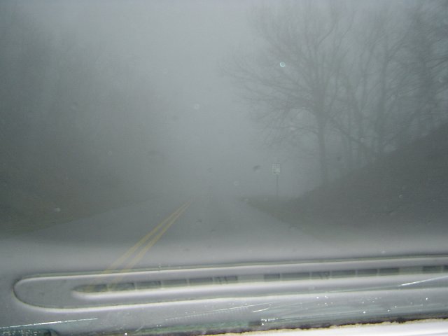 fog or mist on the road through the windscreen