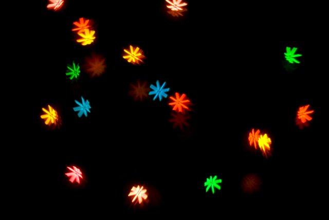 a pattern of colourful bokeh shapes