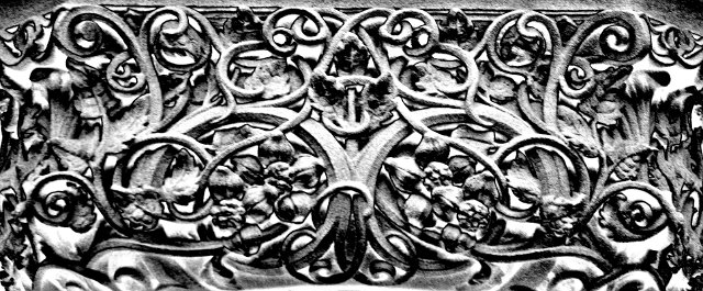 scrollwork patterns in stone carvings