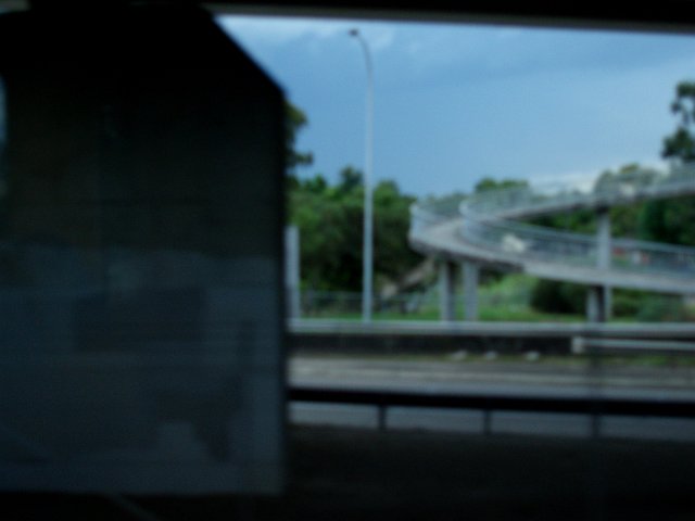 spiral concrete pedestrian walkway blurred
