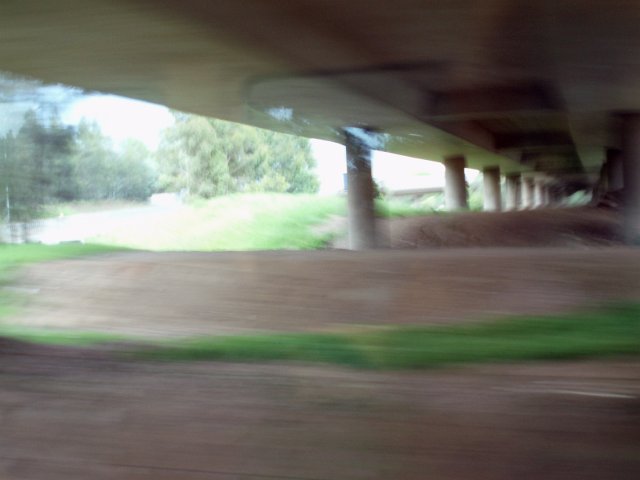 blurred view of the underside of the freeway
