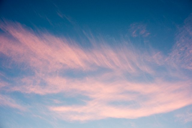 a candyfloss sky of pink cirrus clouds