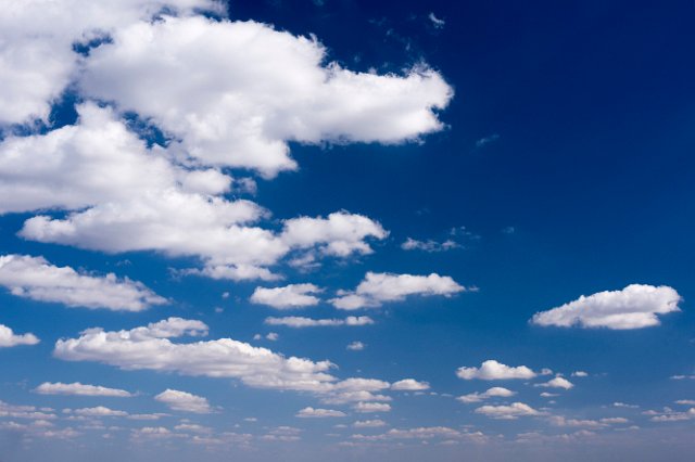 a beautiful blue sky full of fluffy white clouds