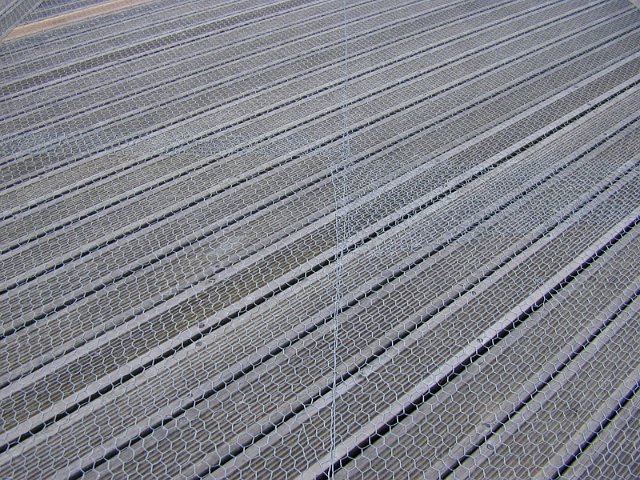 wooden decking with chicken wire